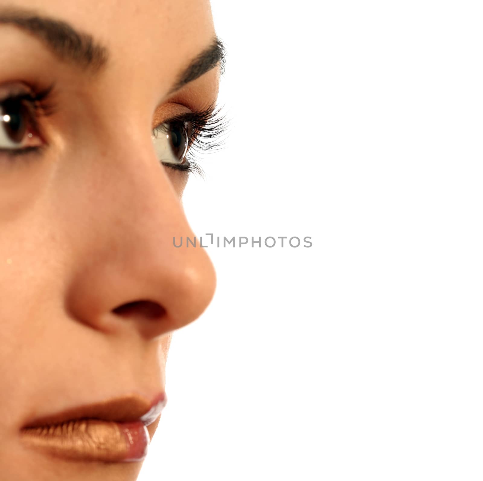 Close-up image of a girl's face. Isolated on white