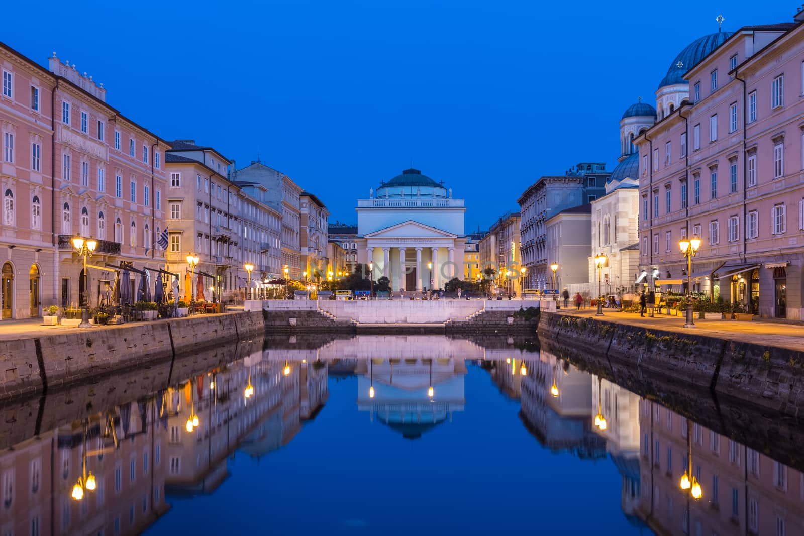 The huge church of St. Antonio Thaumaturgo is situated at the northern end of the Canale Grande. Its neo classical front facade and the cupola represents one of the emblems of the Trieste, city and seaport in northeastern Italy, Europe.