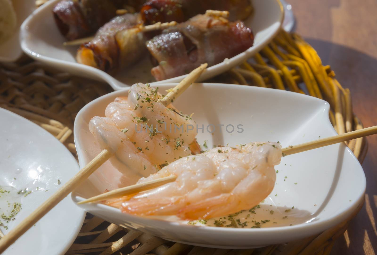 Shrimp tapas on sticks. Tapas on sticks in a restaurant. Mallorca, Balearic islands, Spain.