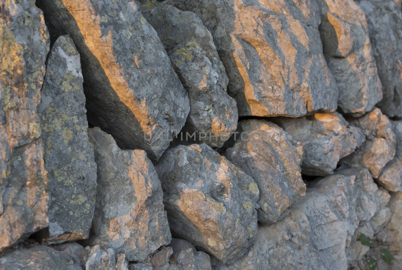 Rock wall afternoon sunlight. Mallorca, Balearic islands, Spain.