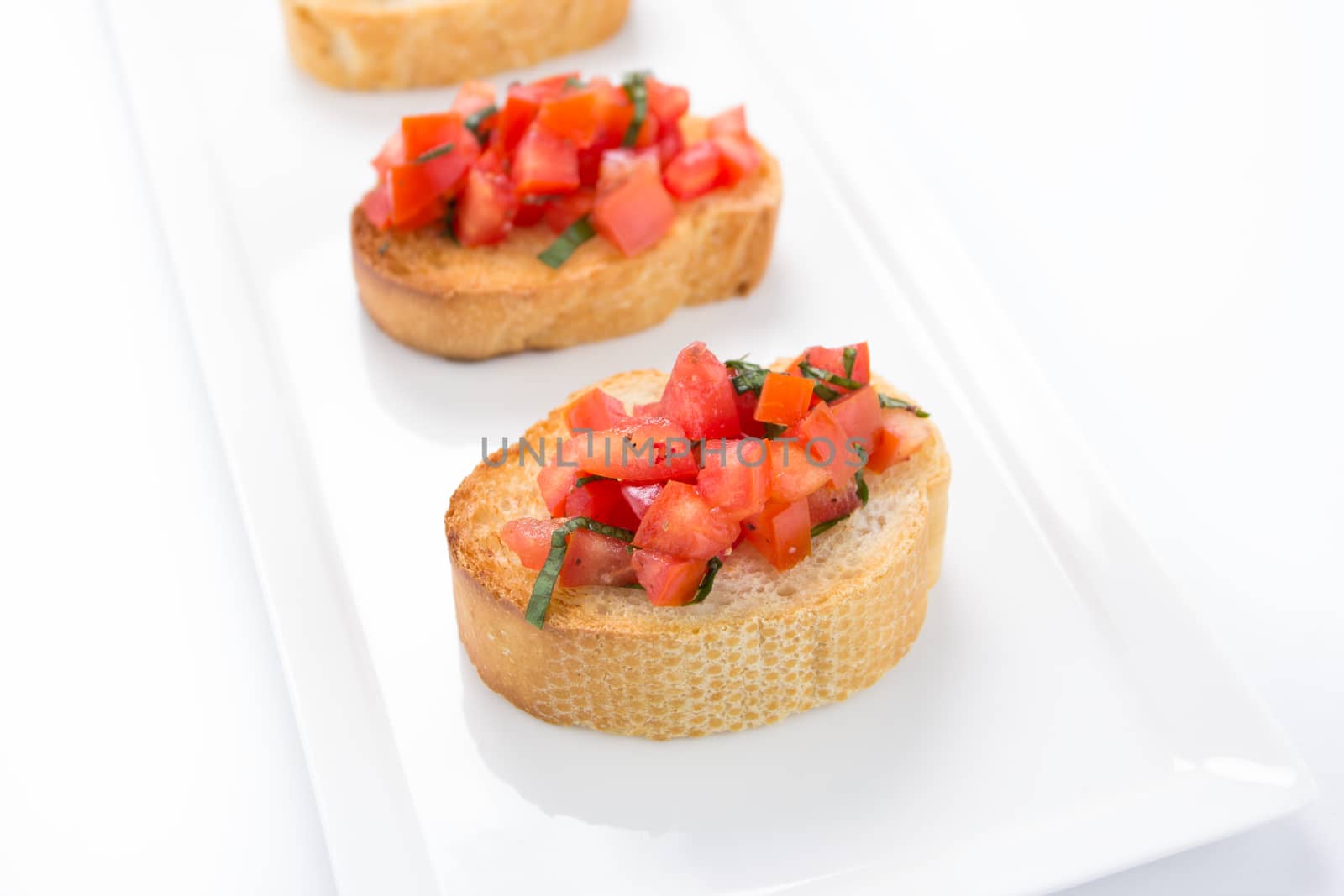 Bruschetta with roasted bell pepper, goat cheese, garlic and herbs