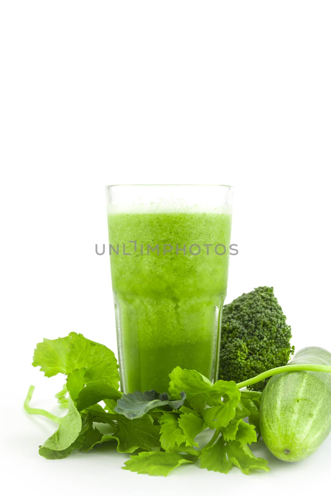 Healthy green smoothie on white background