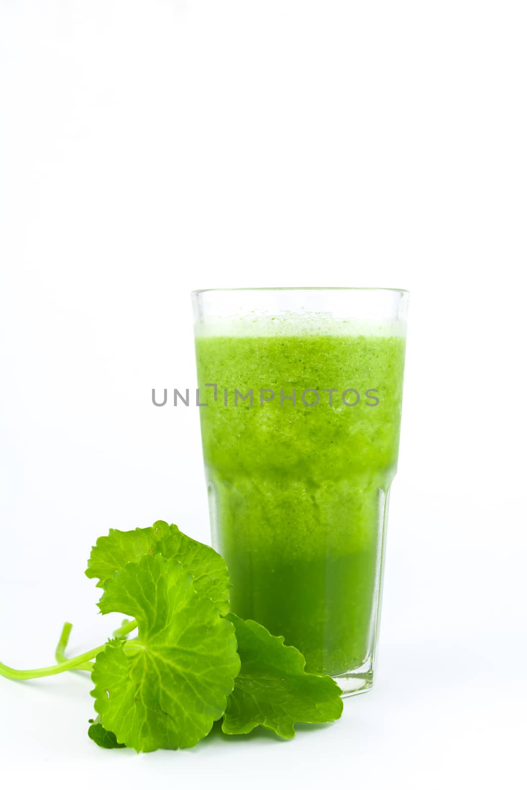 Pennywort or asiatic herbal Smoothie in glass, Helathy drink on white background 