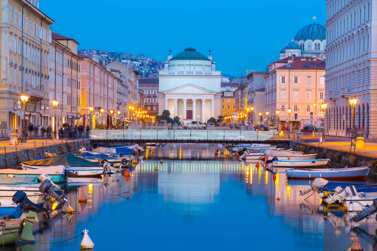 The huge church of St. Antonio Thaumaturgo is situated at the northern end of the Canale Grande. Its neo classical front facade and the cupola represents one of the emblems of the Trieste, city and seaport in northeastern Italy, Europe.