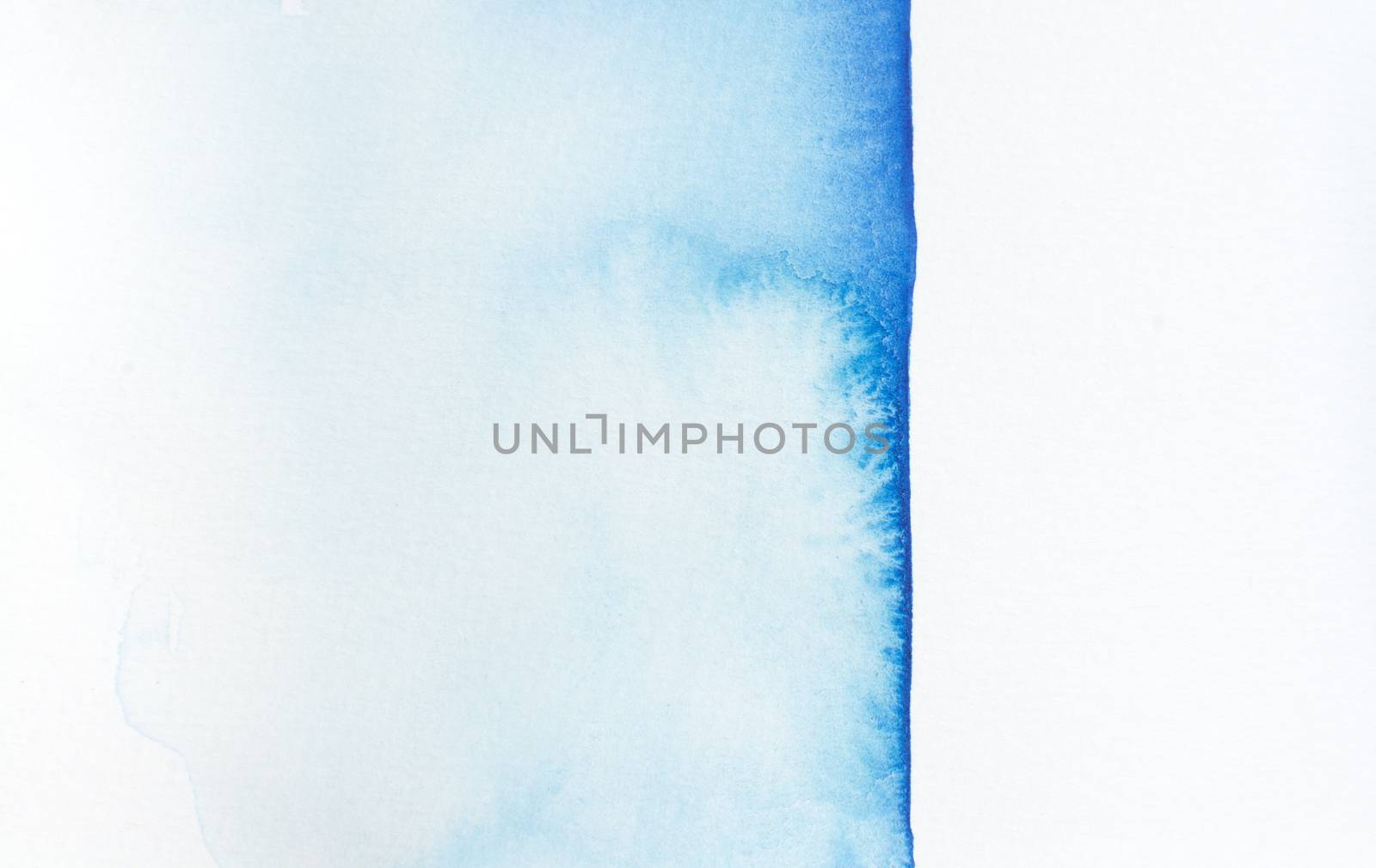 Blue watercolor margin. Abstract textured and organic watercolor background with sharp edge to the right fading into white on the left.