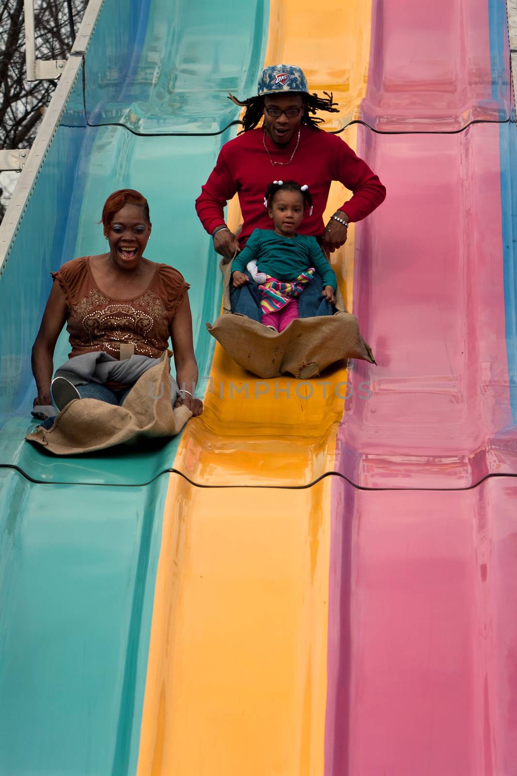 Family Goes Down Fun Slide At Atlanta Fair by BluIz60