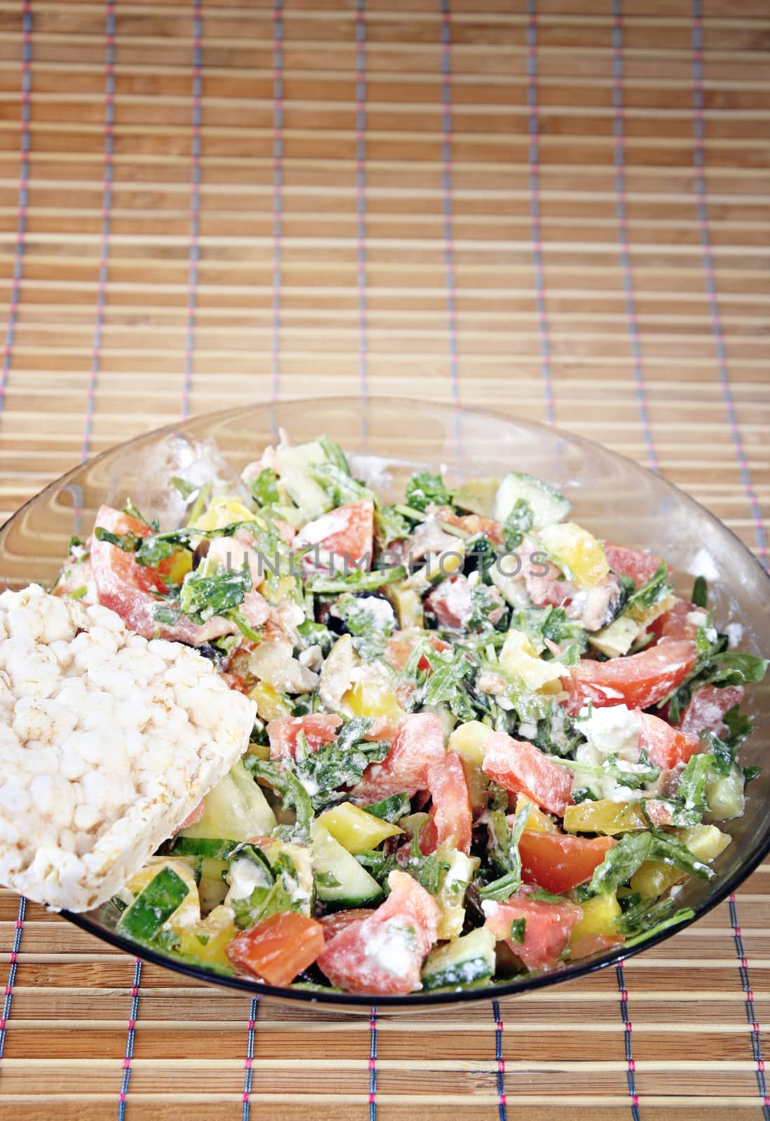 Healthy salad with vegetables and cheese