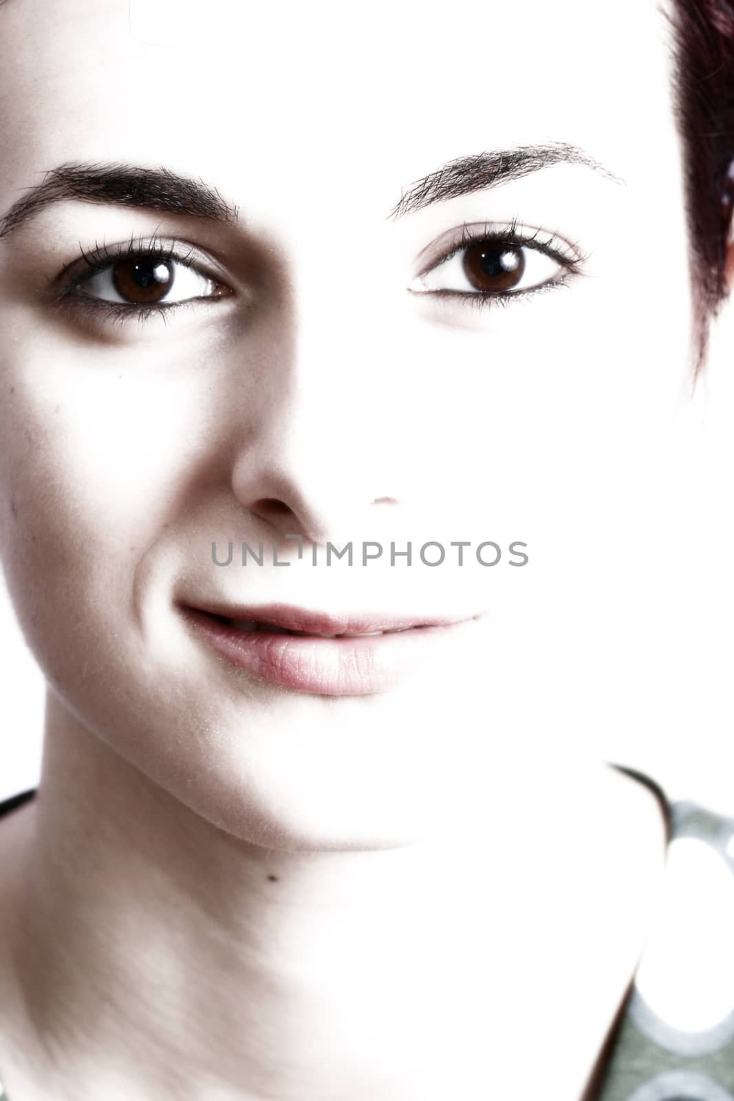 Close-up of a beautiful young woman face.