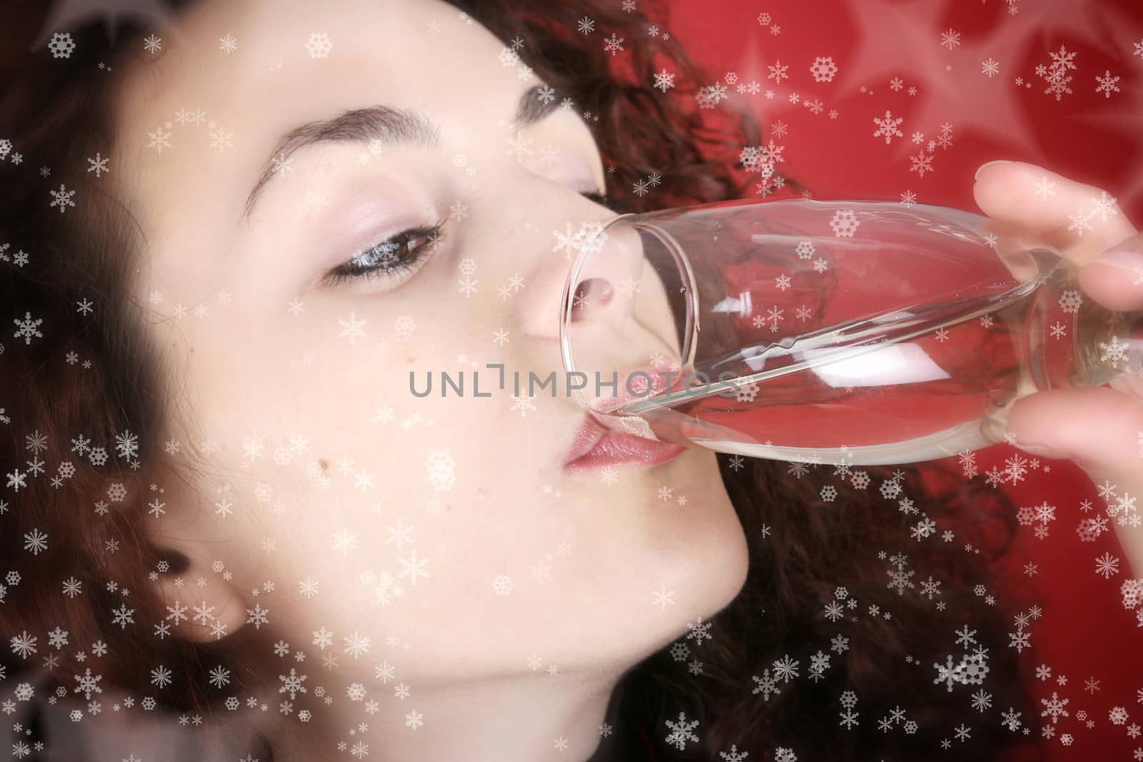 Woman drinking champagne . Happy new year!