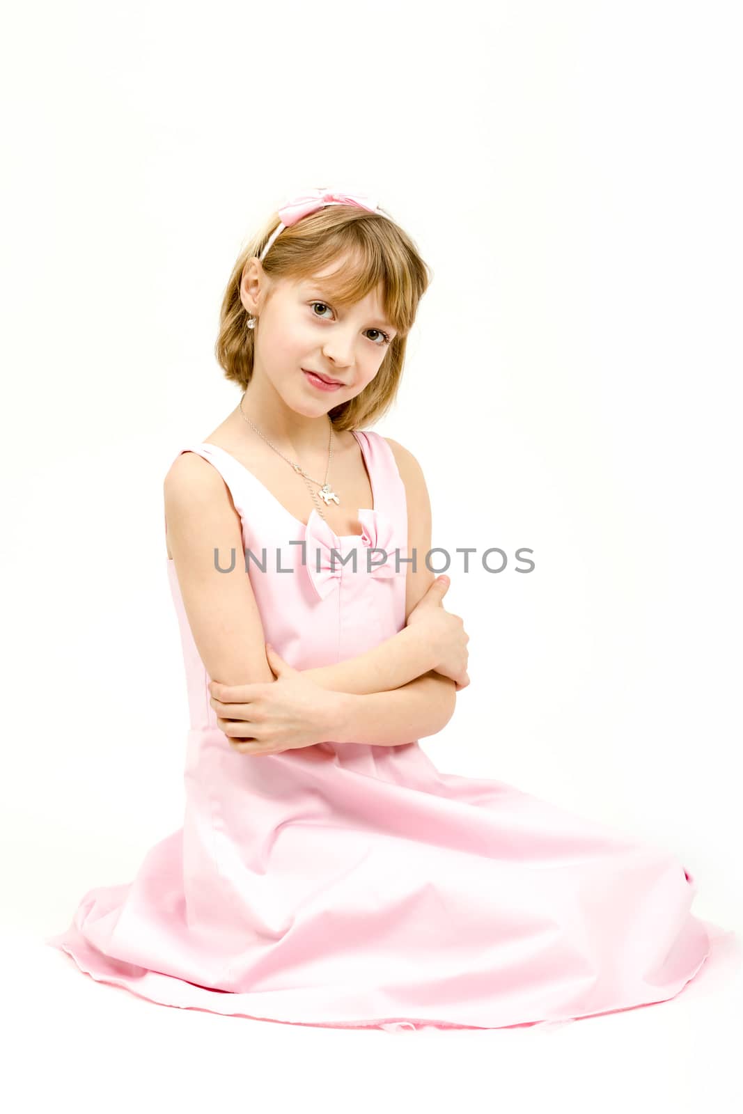 Studio portrait of young beautiful girl with nice eyes on white background