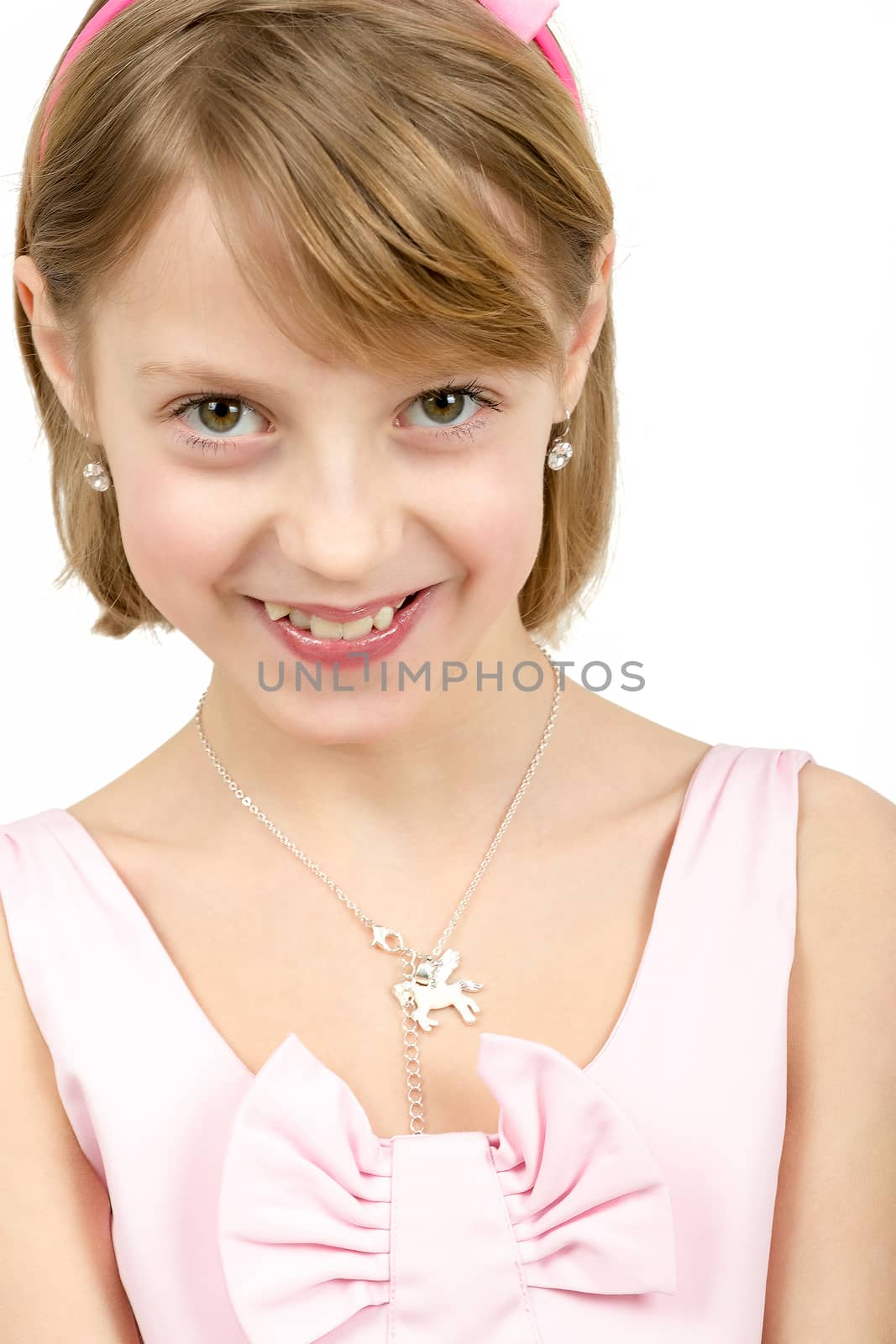 Studio portrait of young smiling beautiful girl with nice eyes on white background