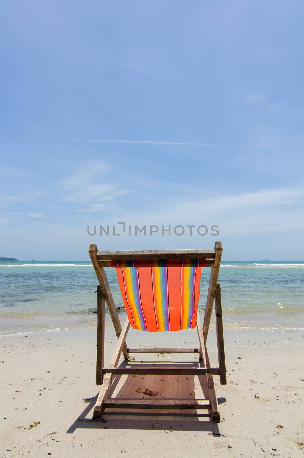 The beach with a chair by Sorapop