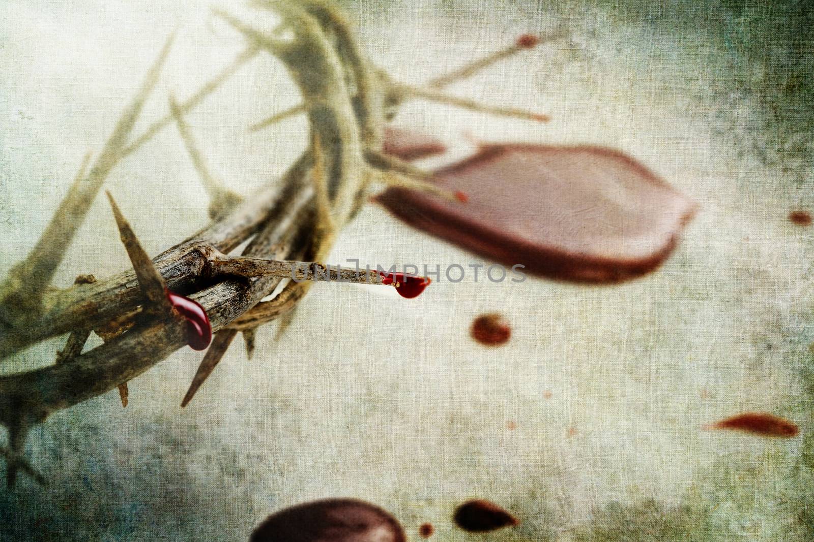 Crown of thorns with drops of blood over grunged background.