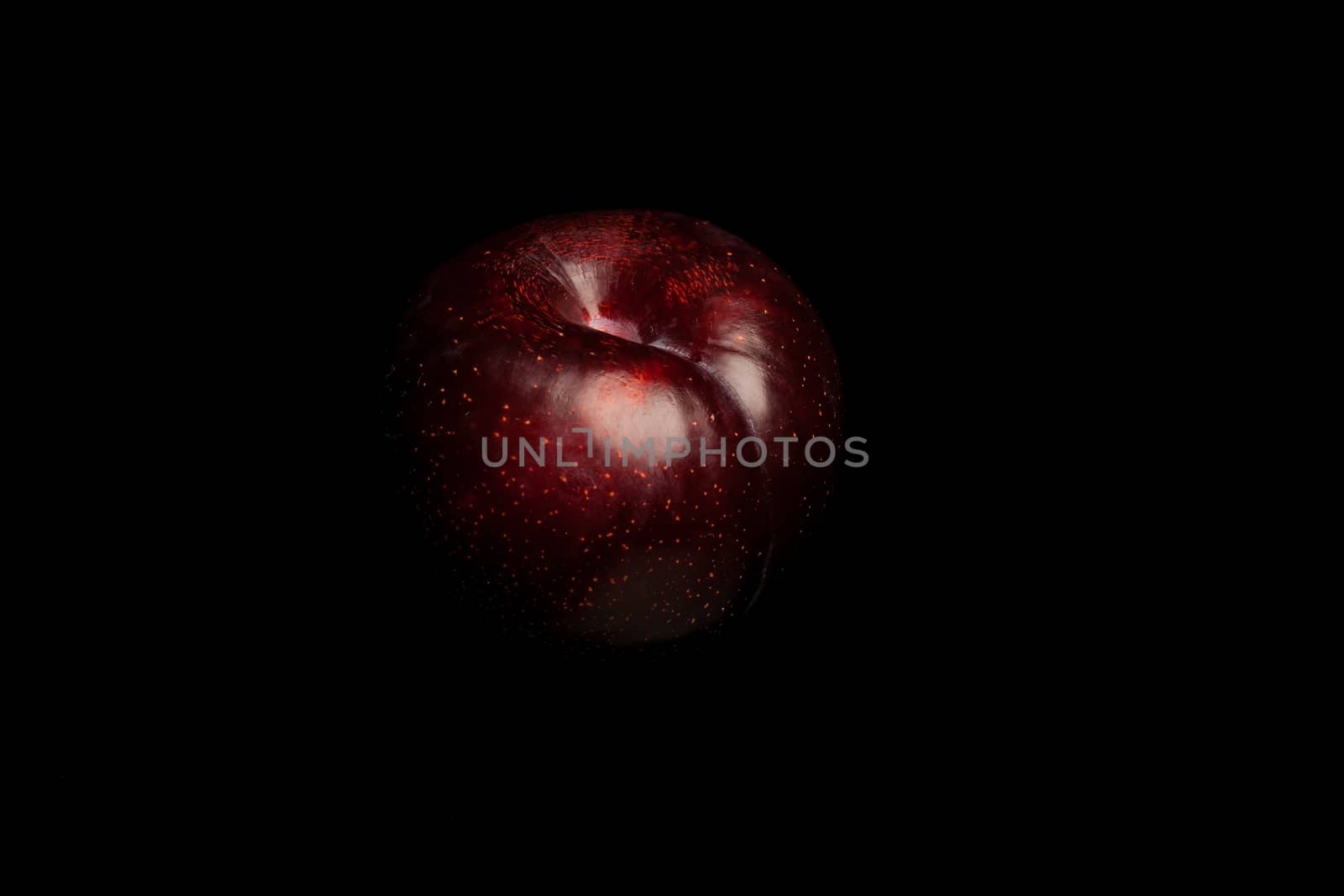 image of a fresh natural organic fruit on black background