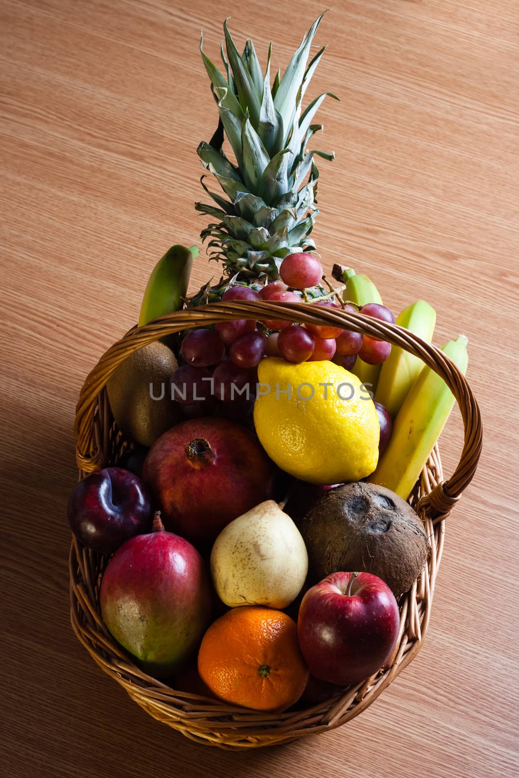 Bunch of exotic fruits in a big basket