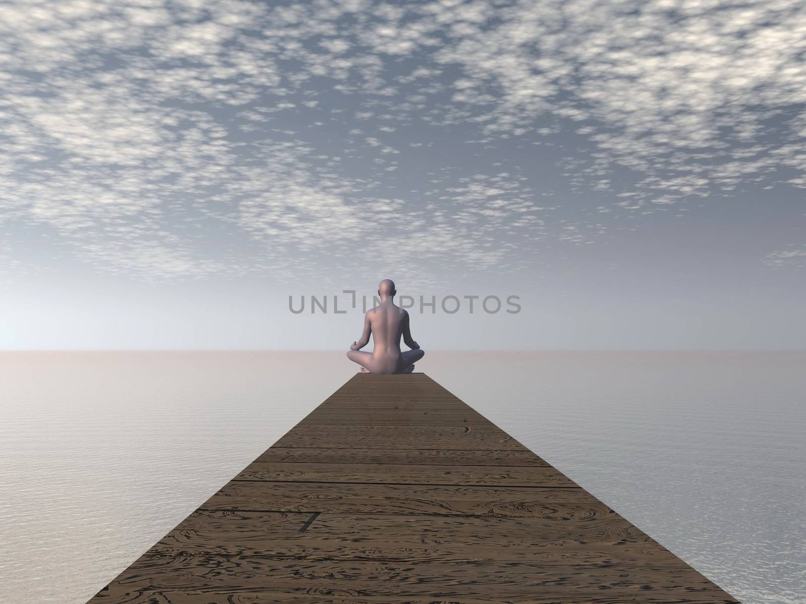 Man meditating on a pontoon in front of the ocean by morning light