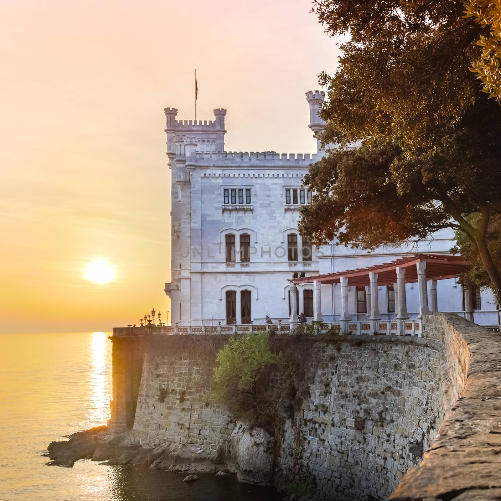 Miramare Castle, Castello di Miramare, in sunset. it is a 19th century castle on the Gulf of Trieste near Trieste, Italy. It was built for Austrian Archduke Ferdinand Maximilian.