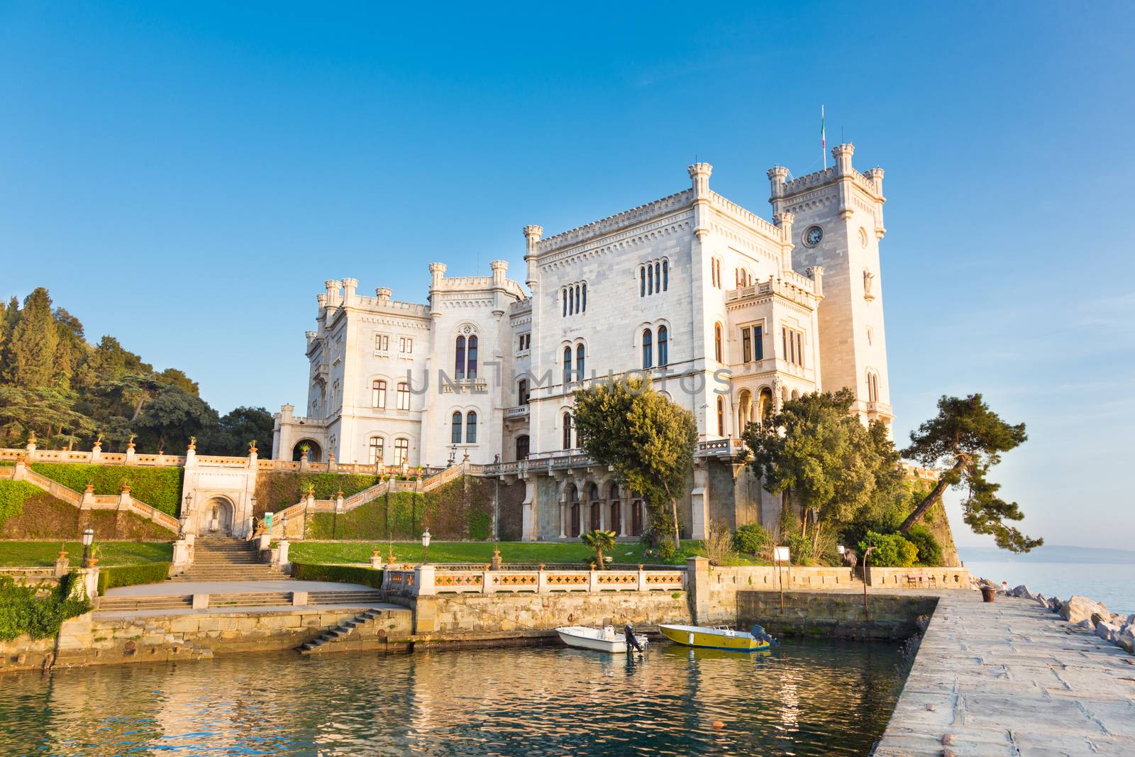 Miramare Castle, Castello di Miramare, in sunset. it is a 19th century castle on the Gulf of Trieste near Trieste, Italy. It was built for Austrian Archduke Ferdinand Maximilian.