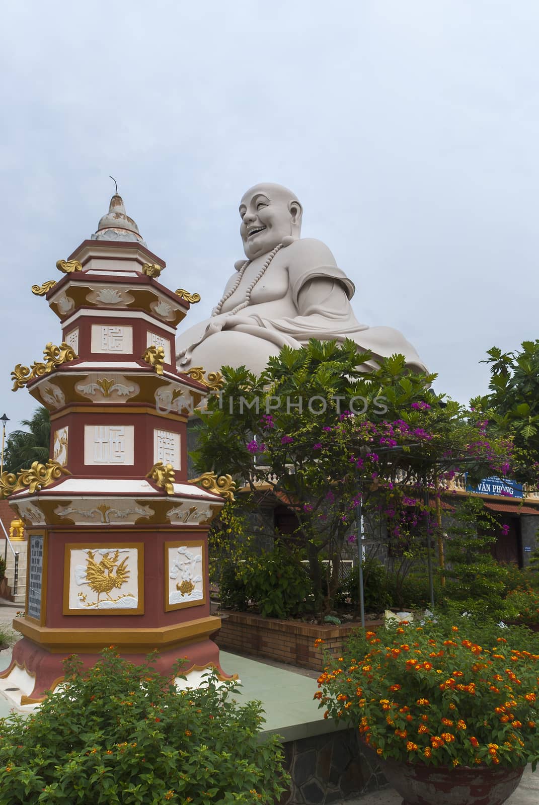 Buddha face combined with memorial stupa. by Claudine