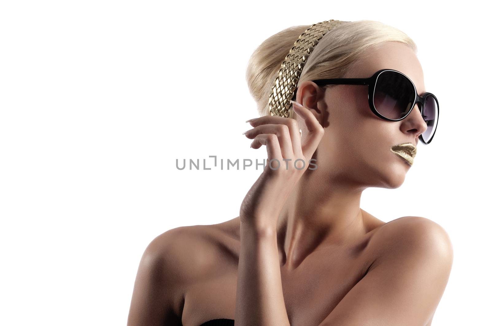 fashion shot of blond woman with sunglasses on by fotoCD