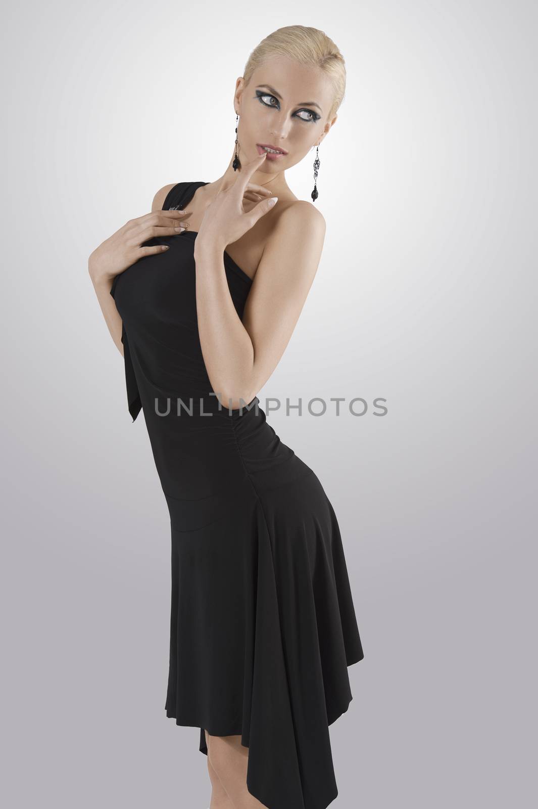 blond girl in black dress standing with pose by fotoCD