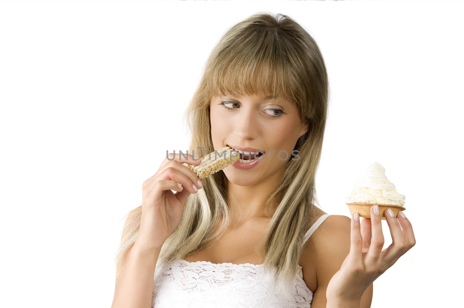 beautiful girl in hesitation to choose between sweet or diet food