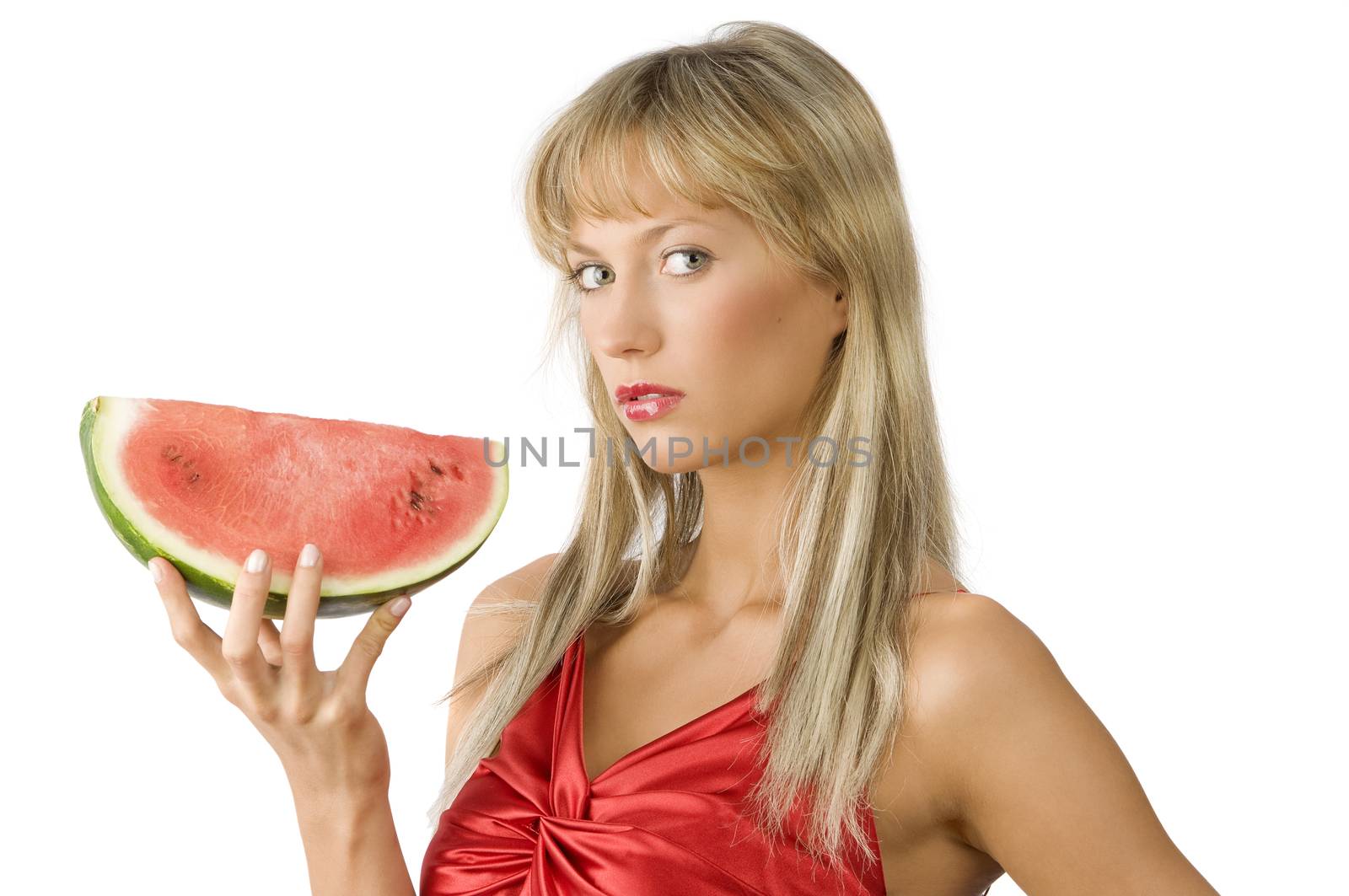 cute blond girl in red dress and red lips keeping a piece of water melon in hand