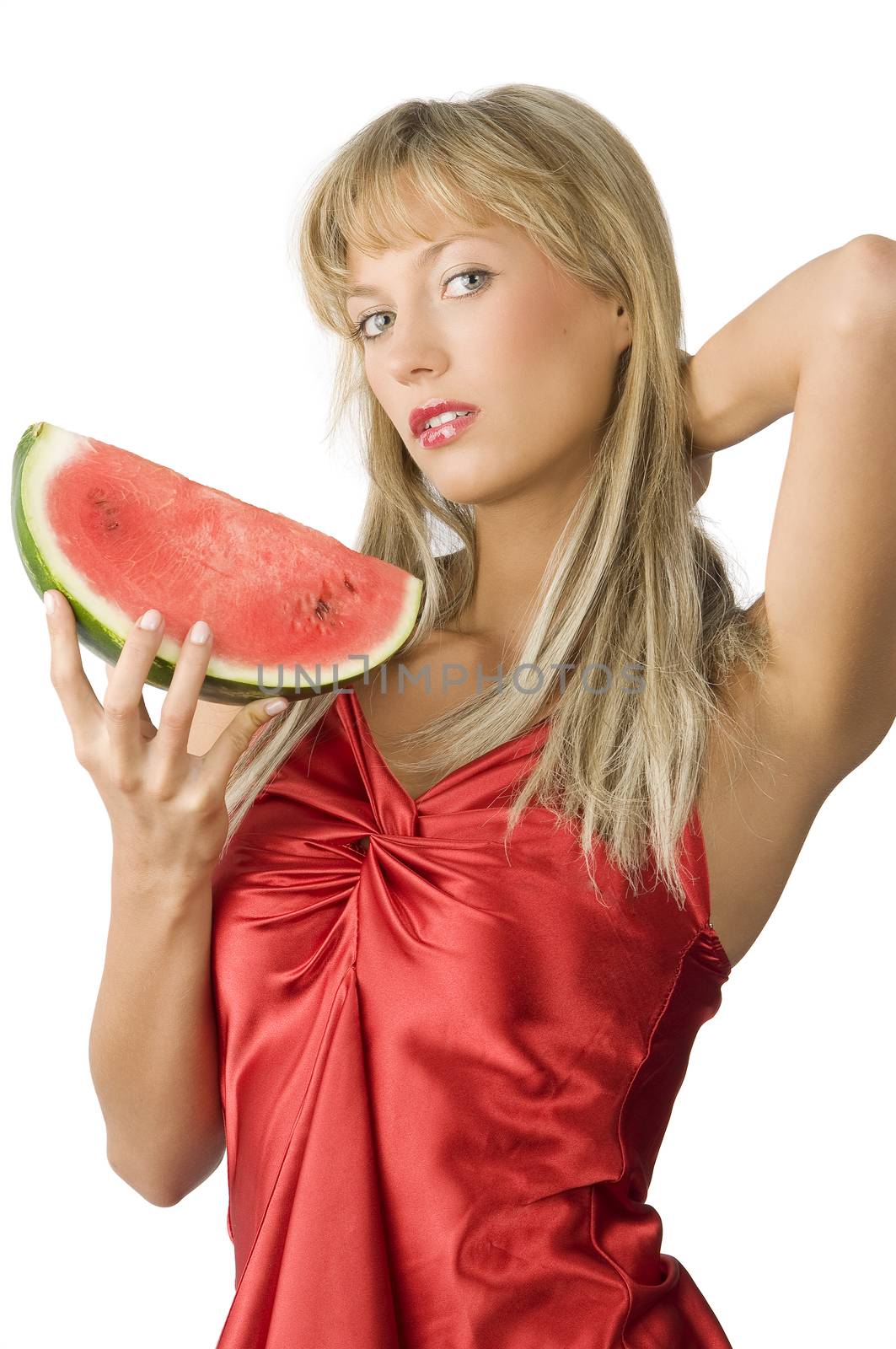 cute blond girl in red dress and red lips and a piece of water melon in her hand
