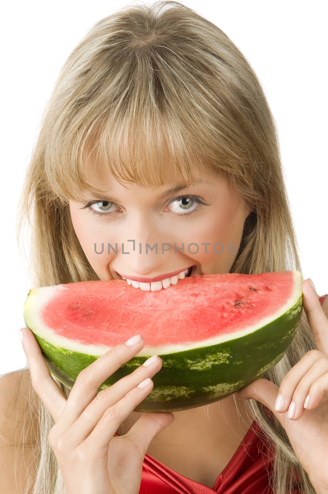 cute blond girl in red dress and red lips eating a piece of water melon