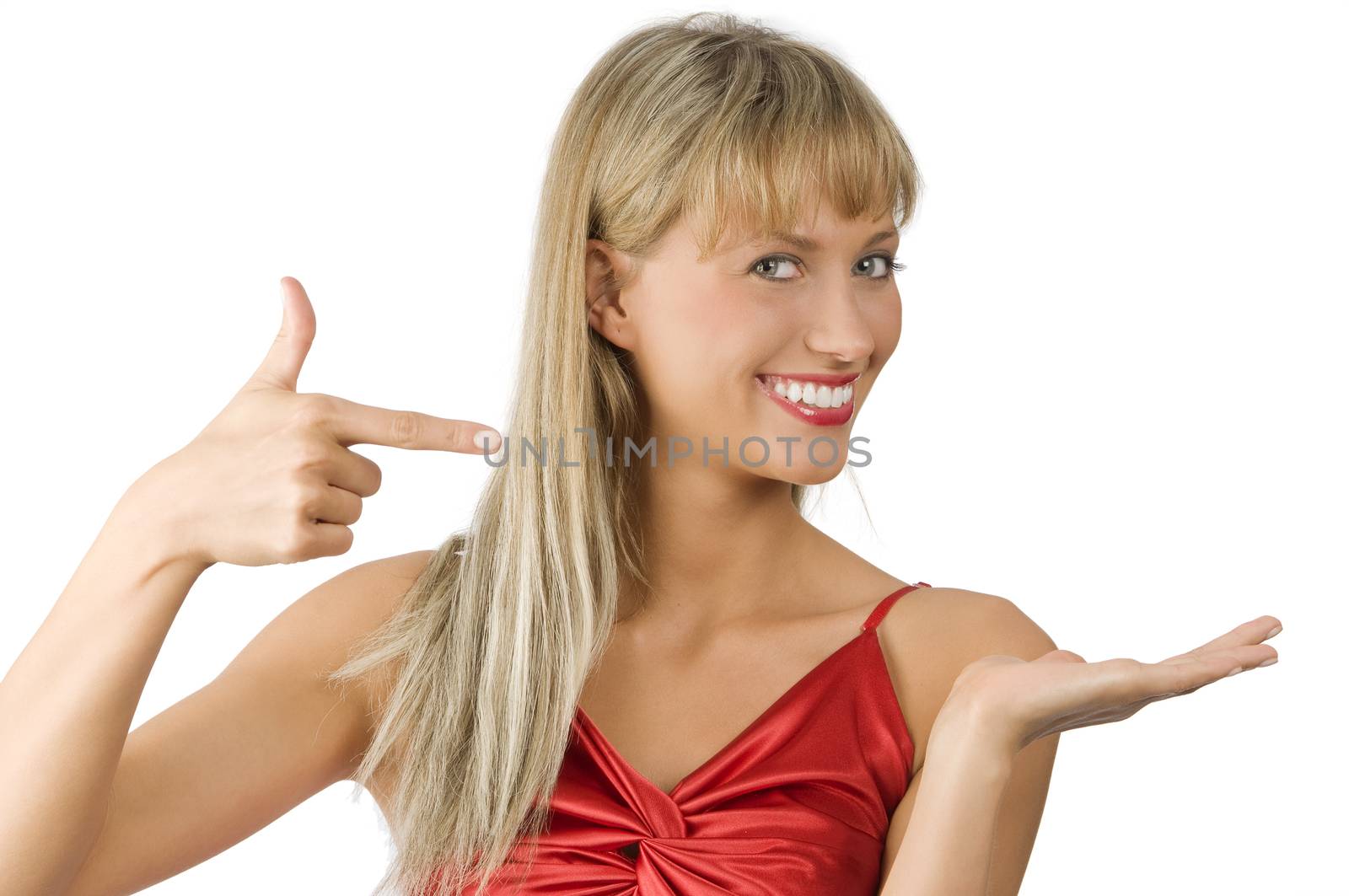 beautiful and smiling woman in red dress presenting a virtual product on white