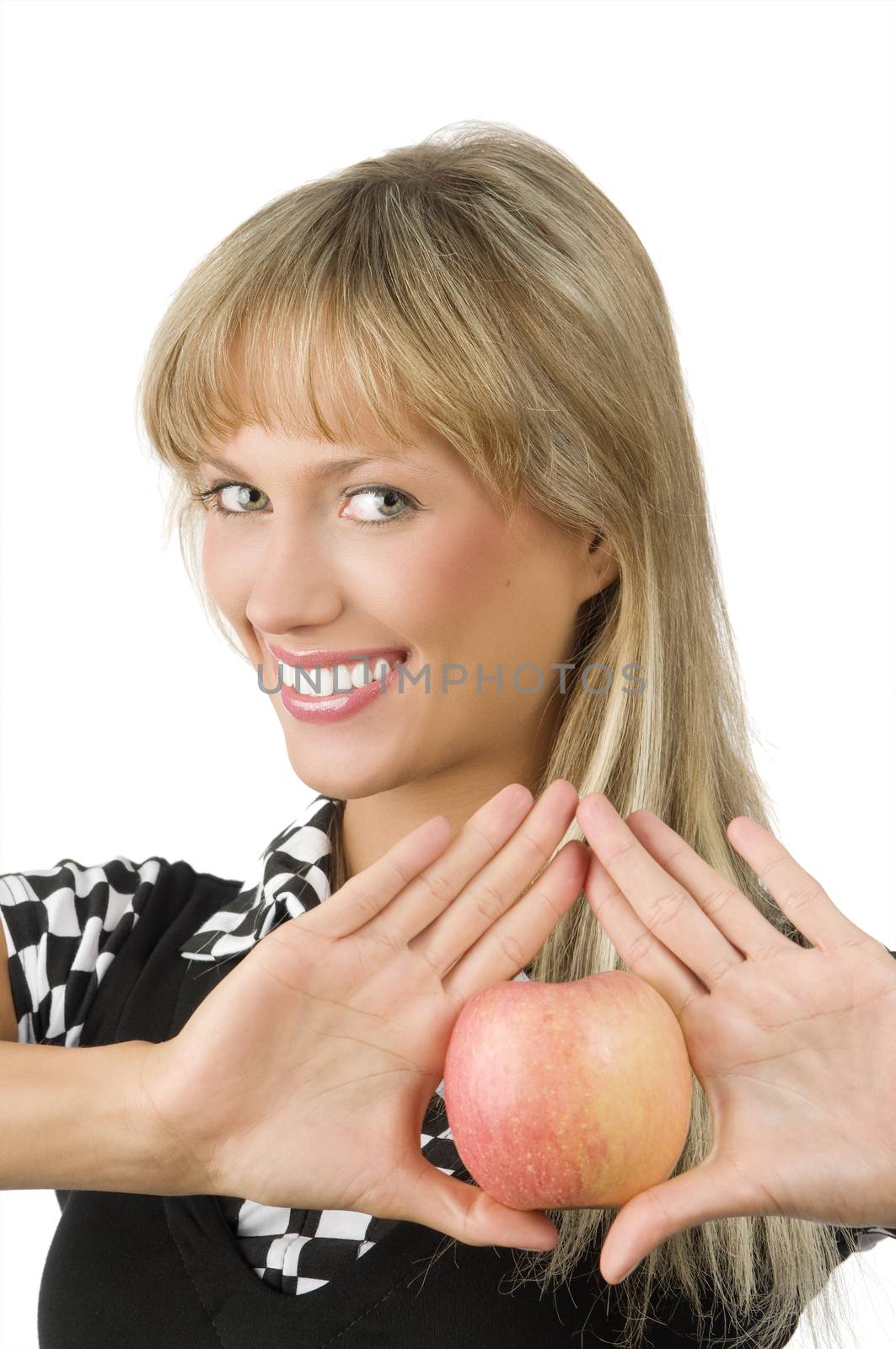 pretty blond woman smiling and keeping a red apple between her open hands
