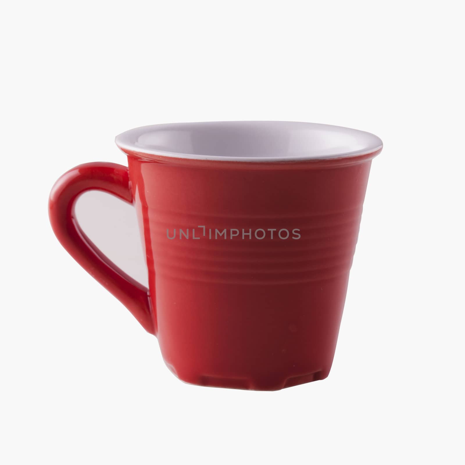 A red cup isolated over white background