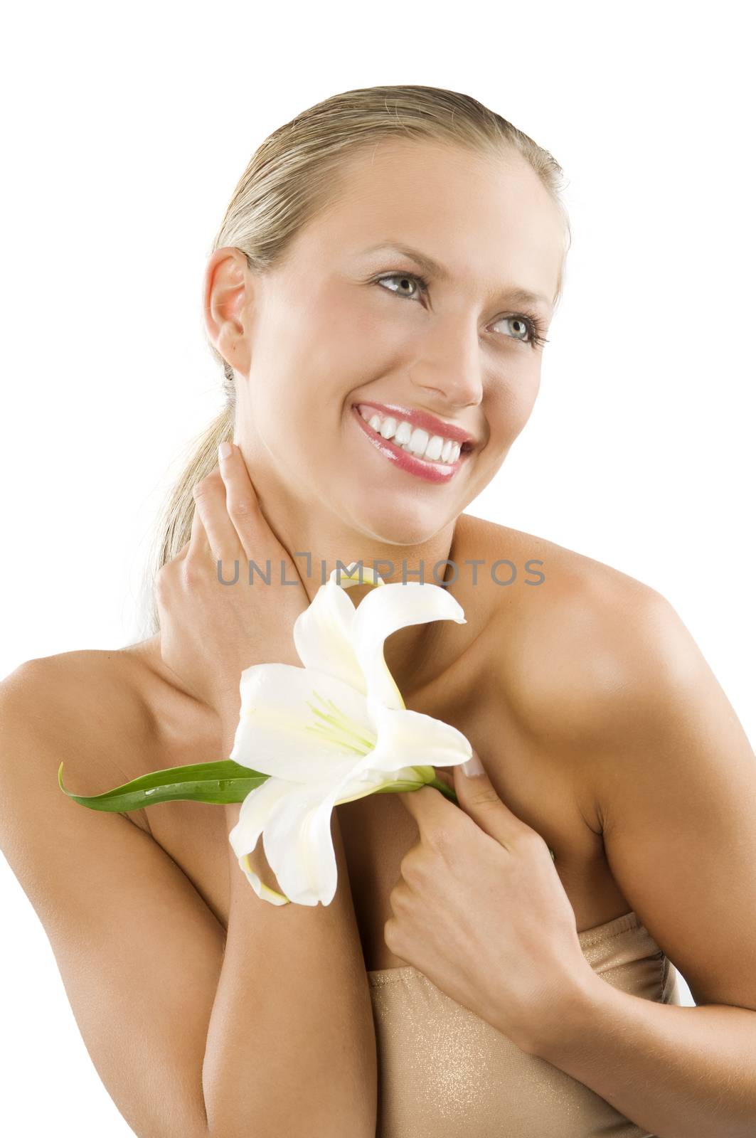 beautiful smiling girl with happy face keeping a white lily in a hand