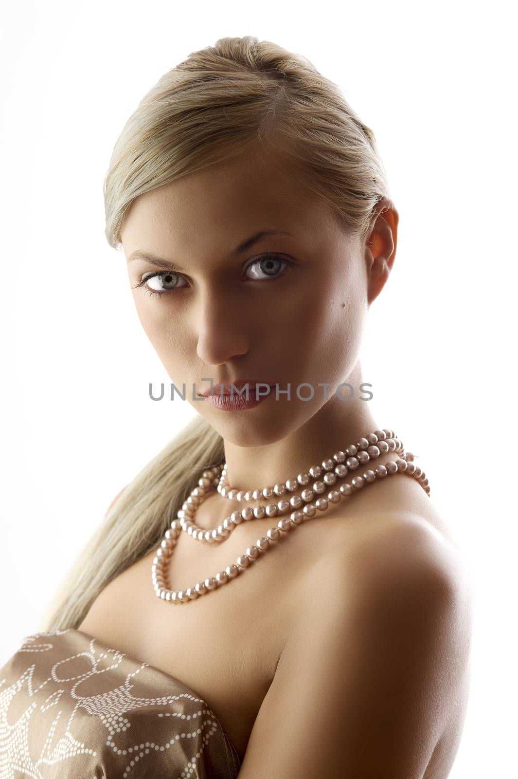 blond and pretty elegant and attractive woman with pearl necklace