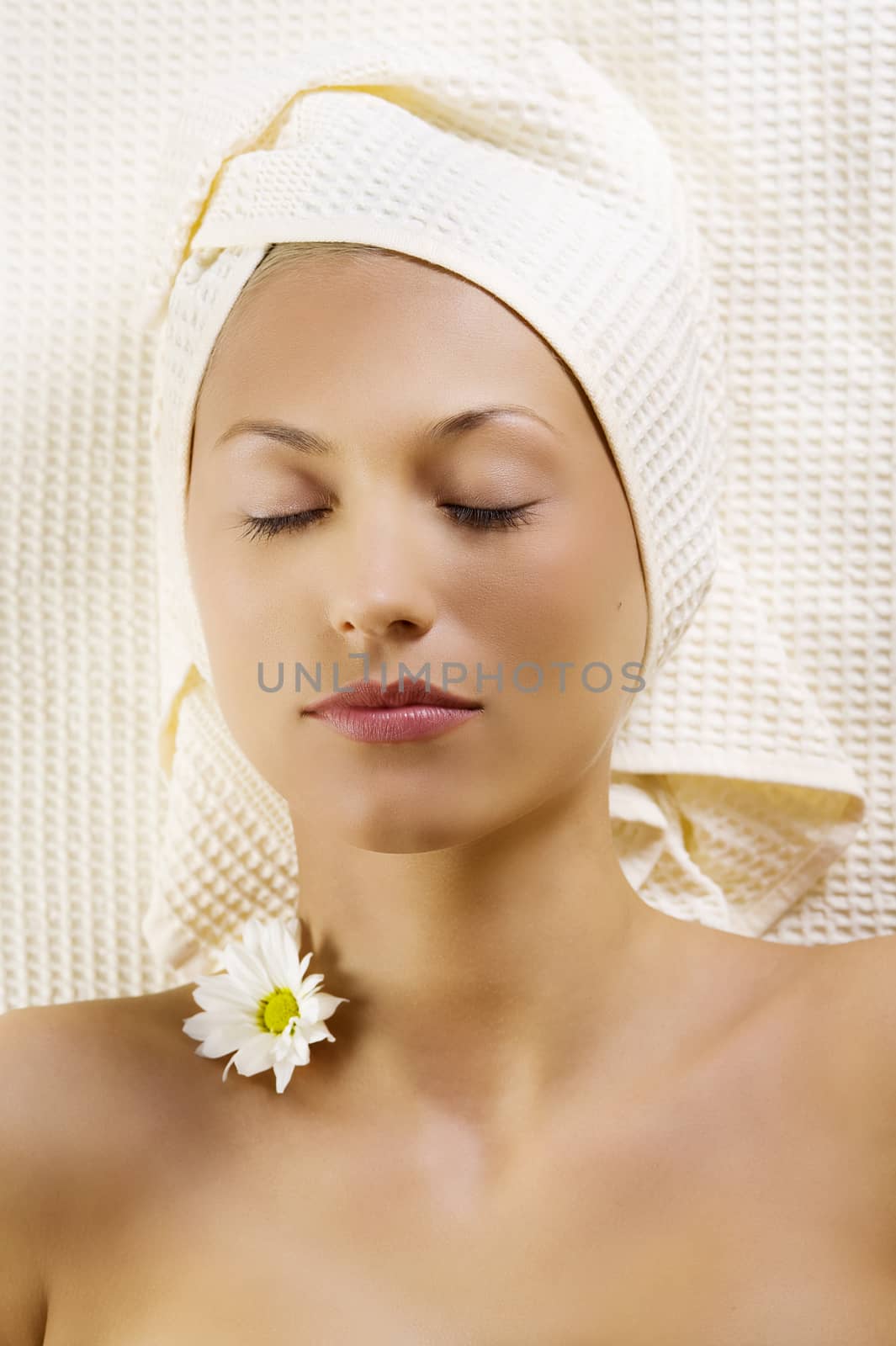 cute girl in spa with flowers by fotoCD