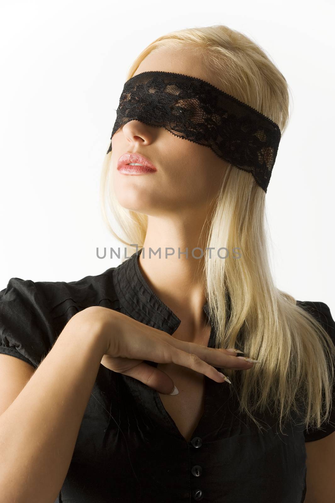 nice portrait of beautiful blond young girl with a black lace mask