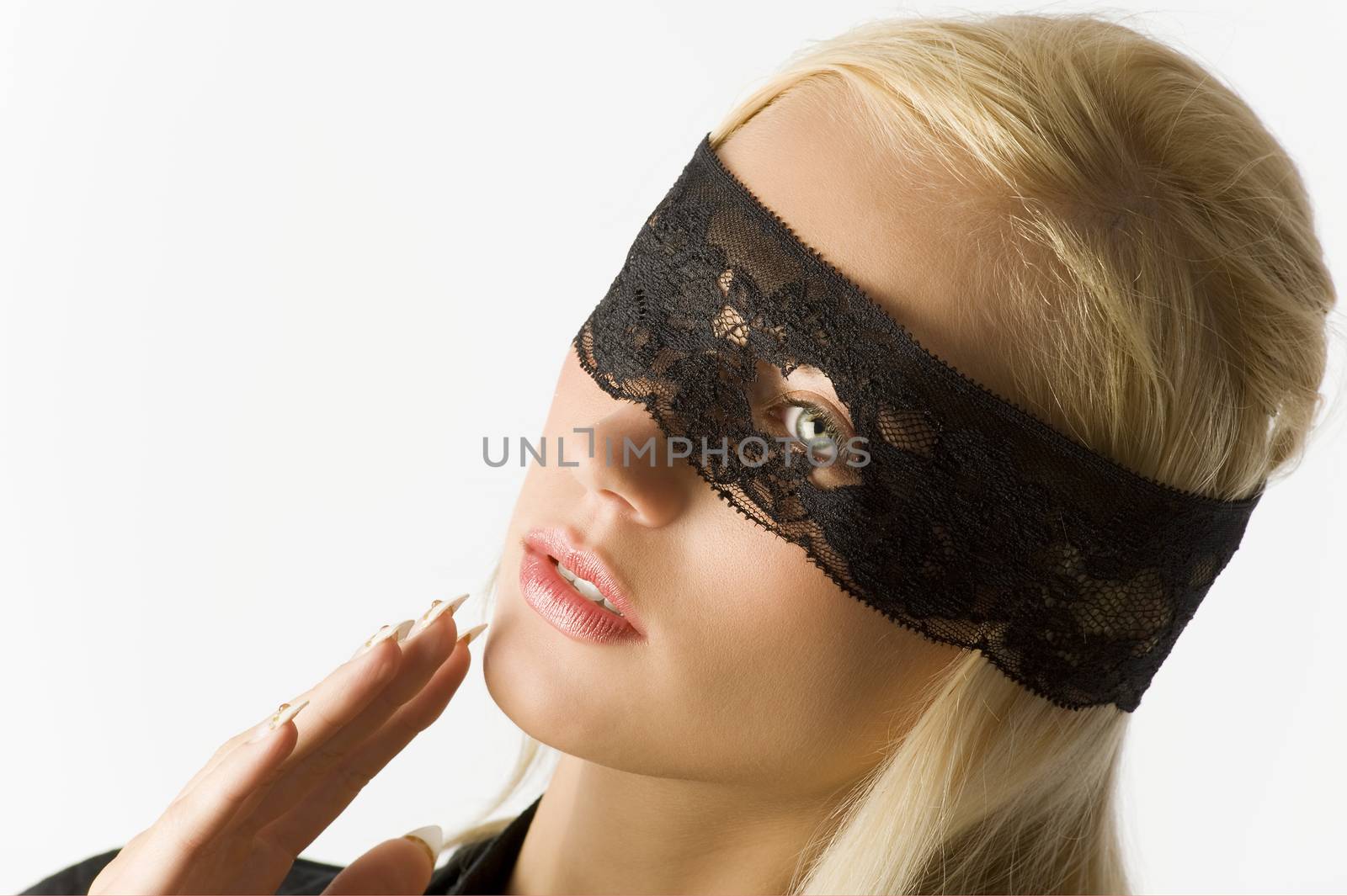 nice portrait of beautiful blond young girl with a black lace mask