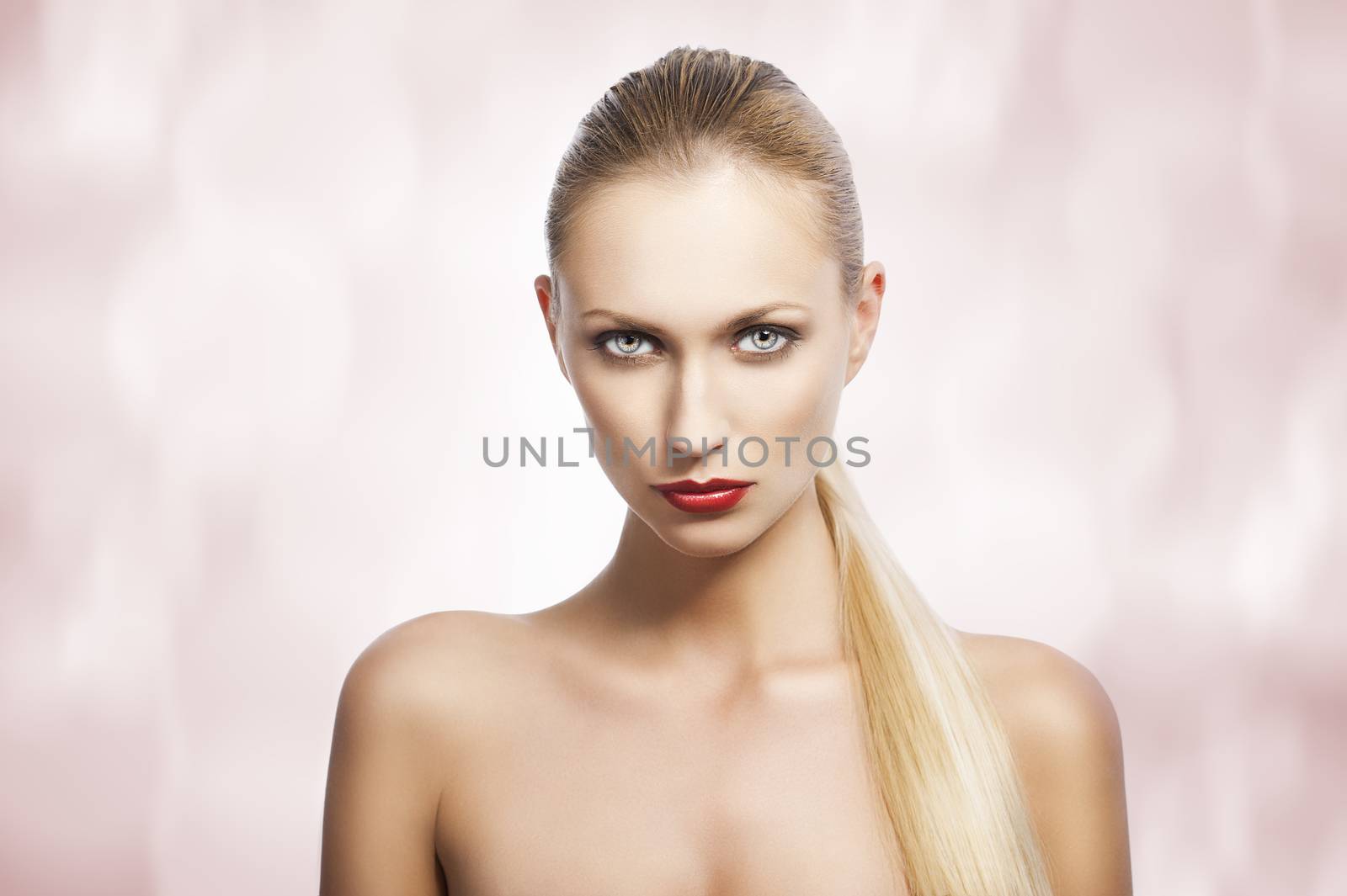 beauty woman over white. She looks in to the lens by fotoCD