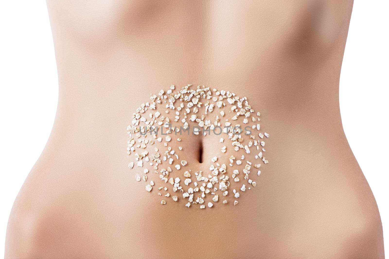 composition of oat flakes placed around the navel