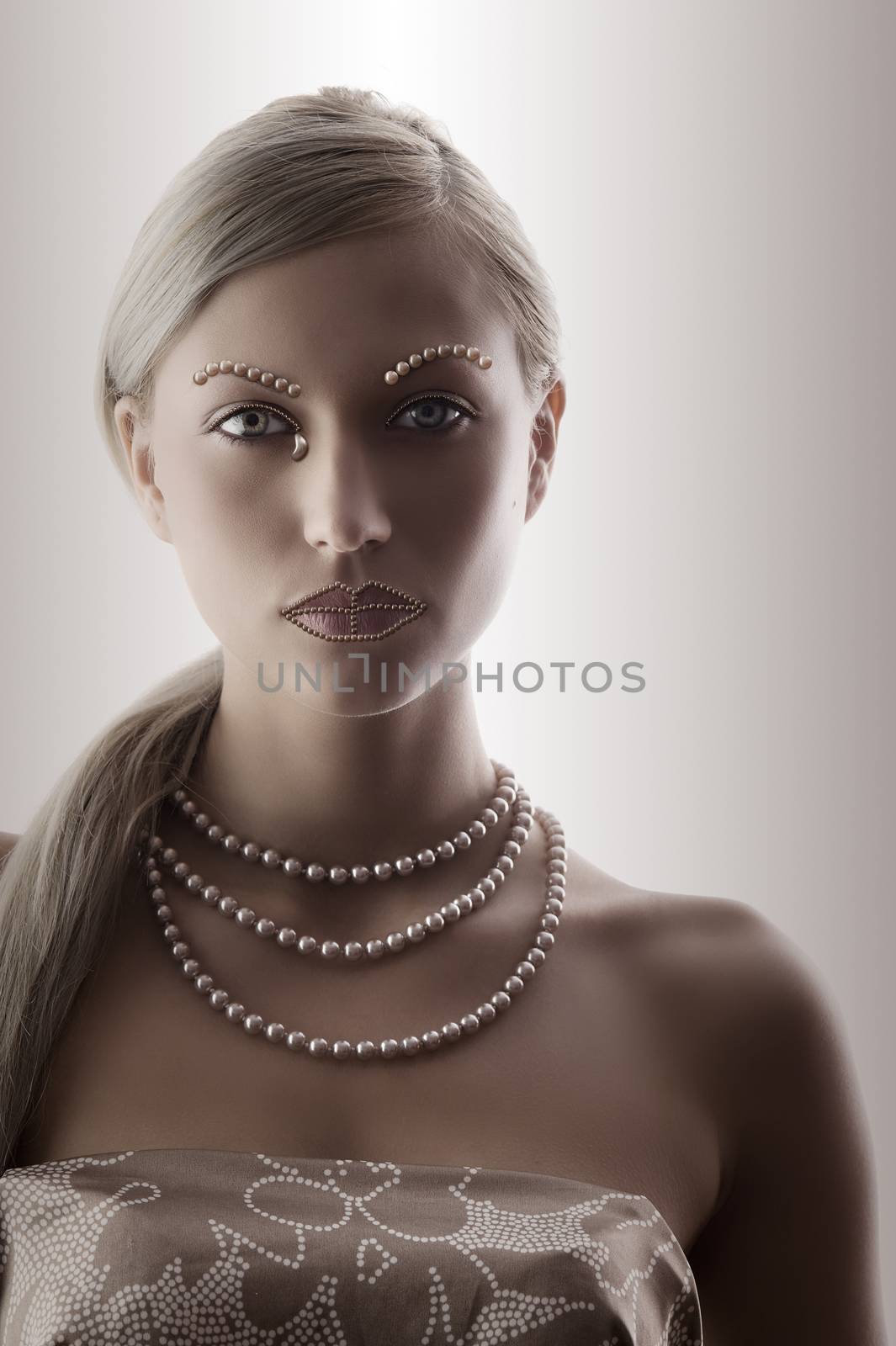 nice portrait with desaturate color of blond woman with necklace