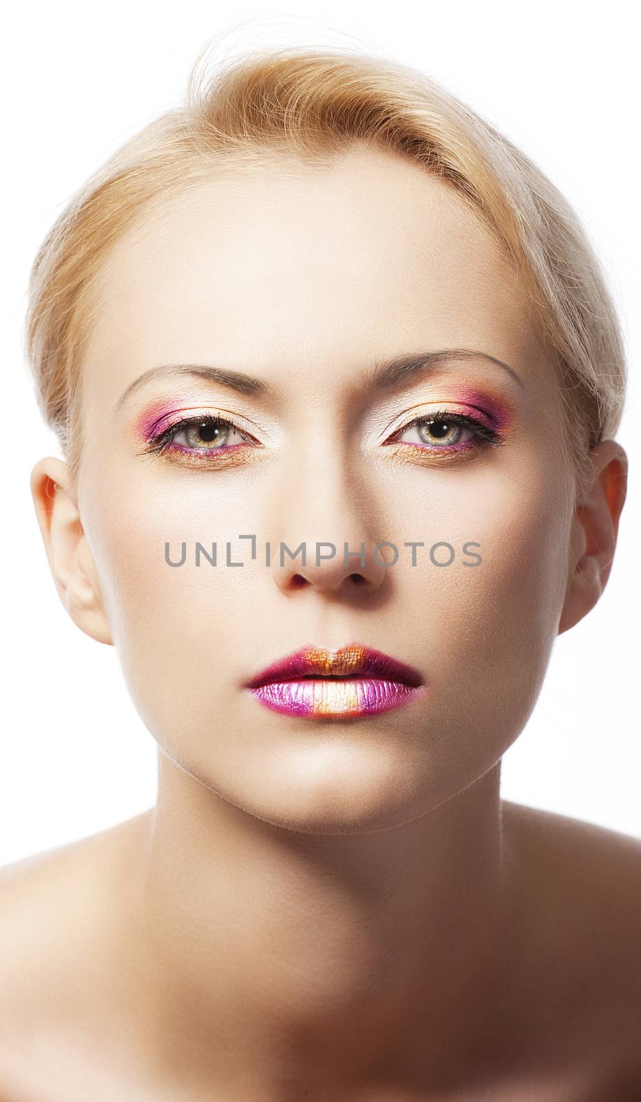 beauty young girl with a floral makeup. She is turned of three quarters and looks in to the lens with attractive expression