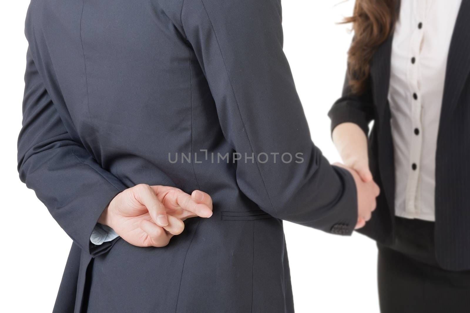 Business woman and man shake hands and put finger cross on back, closeup portrait isolated on white background.