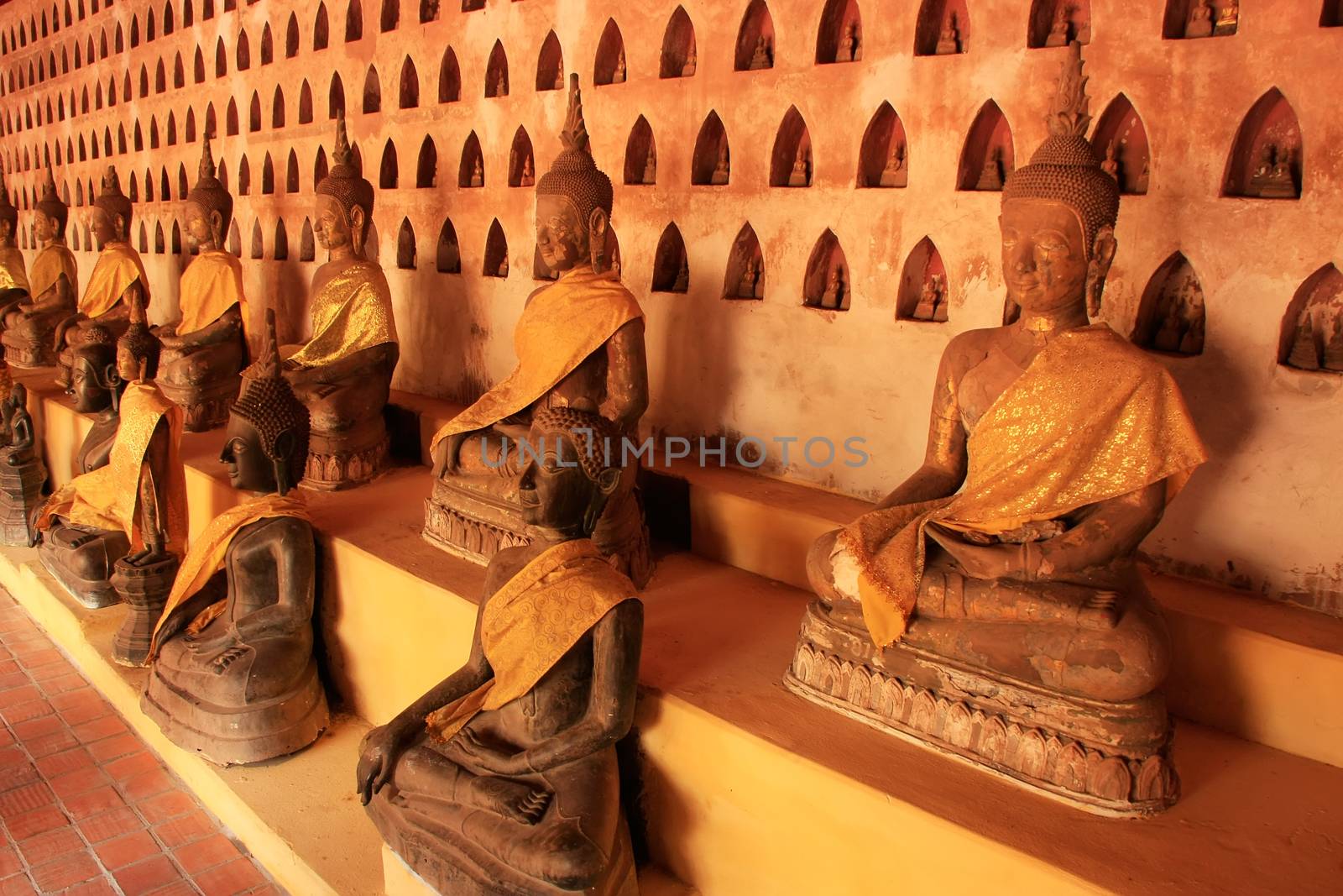 Buddha statues in Wat Si Saket, Vientiane, Laos by donya_nedomam