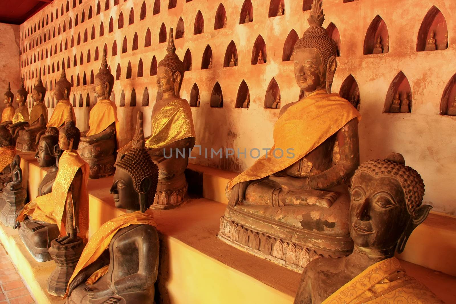 Buddha statues in Wat Si Saket, Vientiane, Laos by donya_nedomam