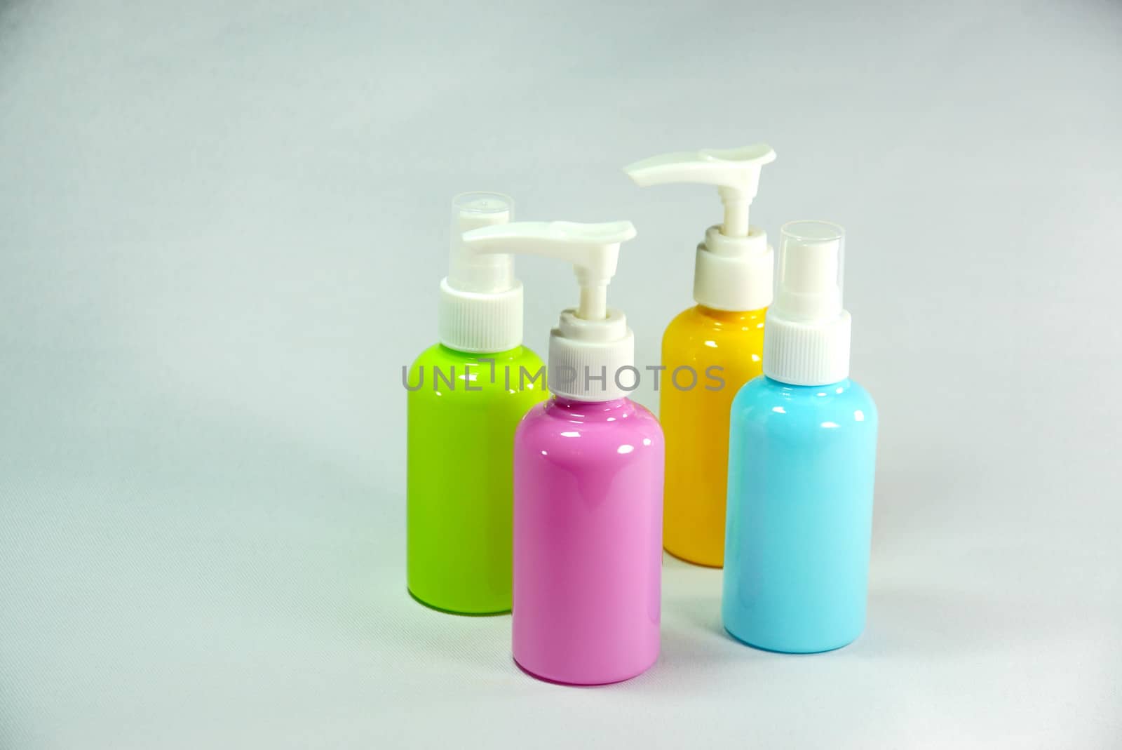 set of plastic spray  and pump bottles by nattapatt