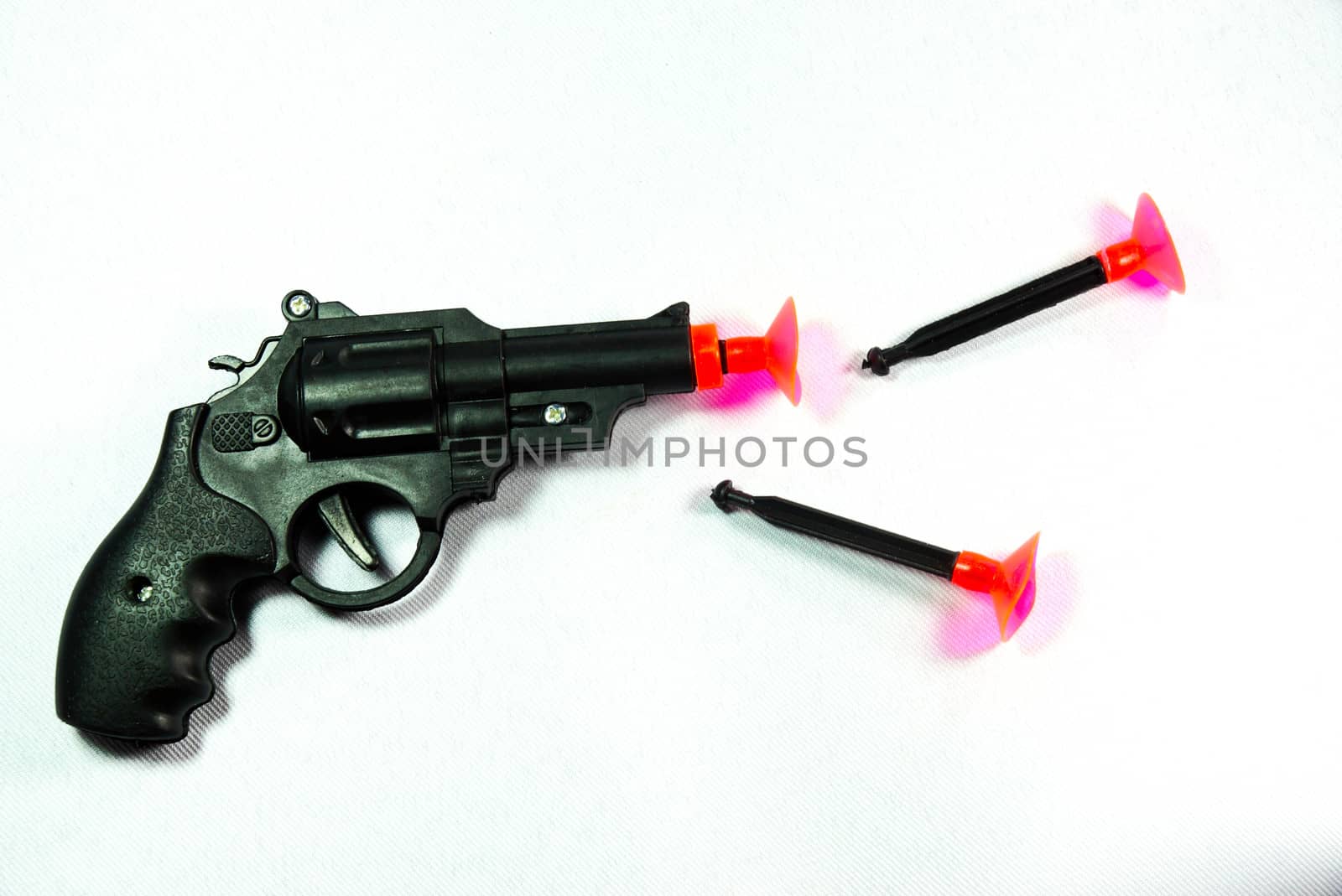 plastic gun on white scene