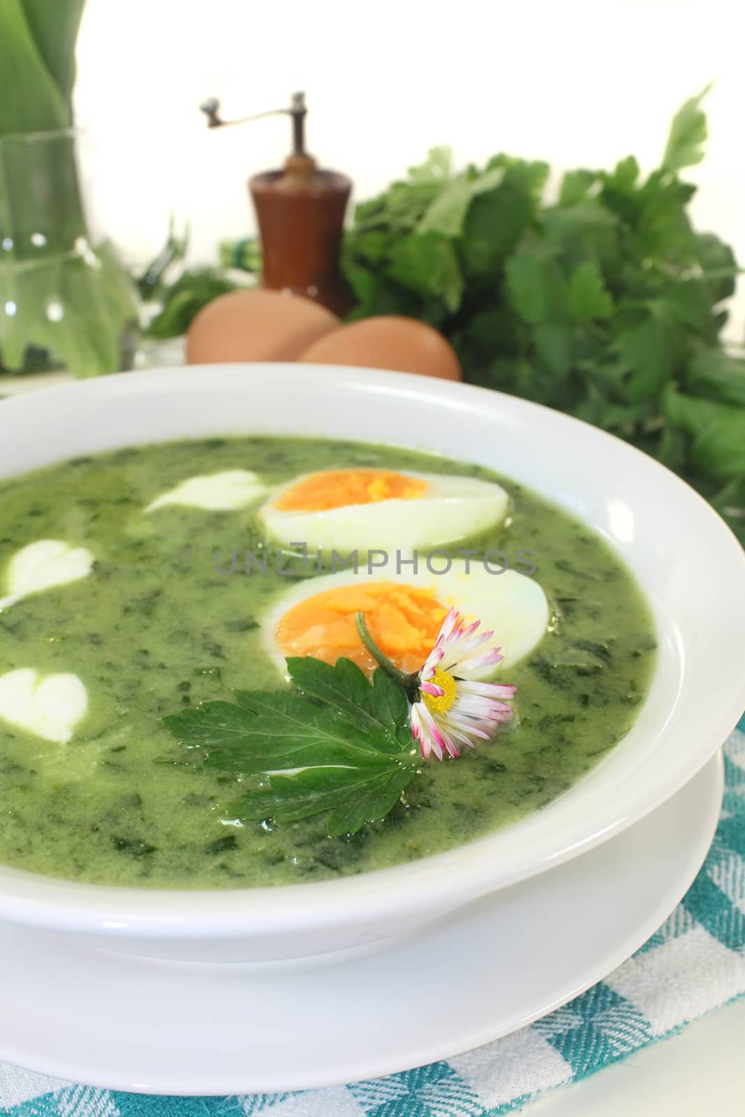 a green herb soup with eggs and cream Fraich