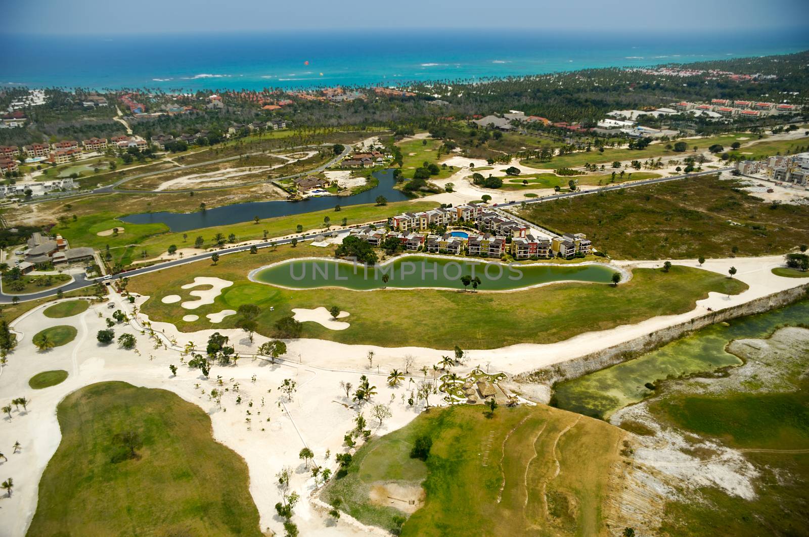 Elevevated view of golf course by cfoto