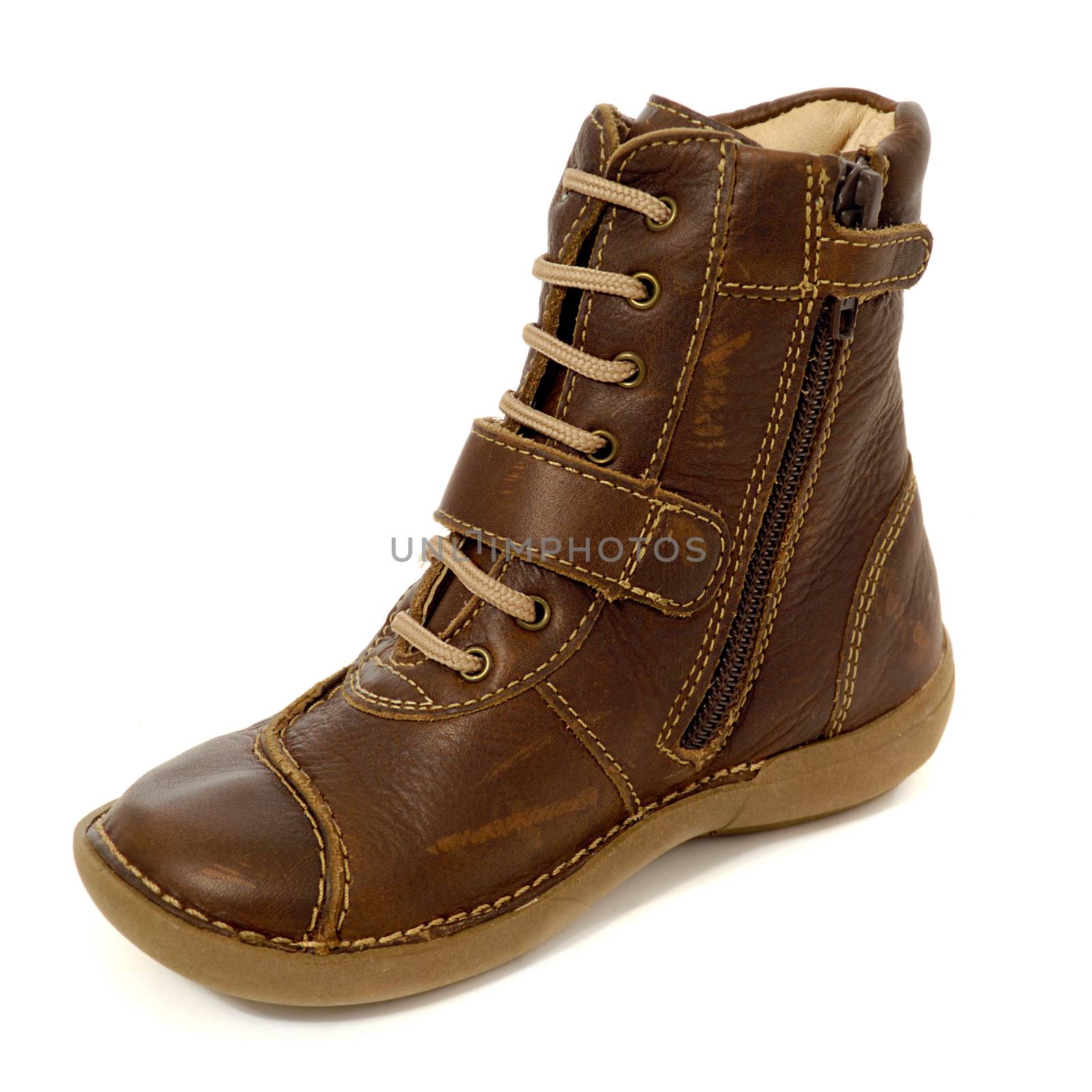 A brown boot. Taken on a clean white background.
