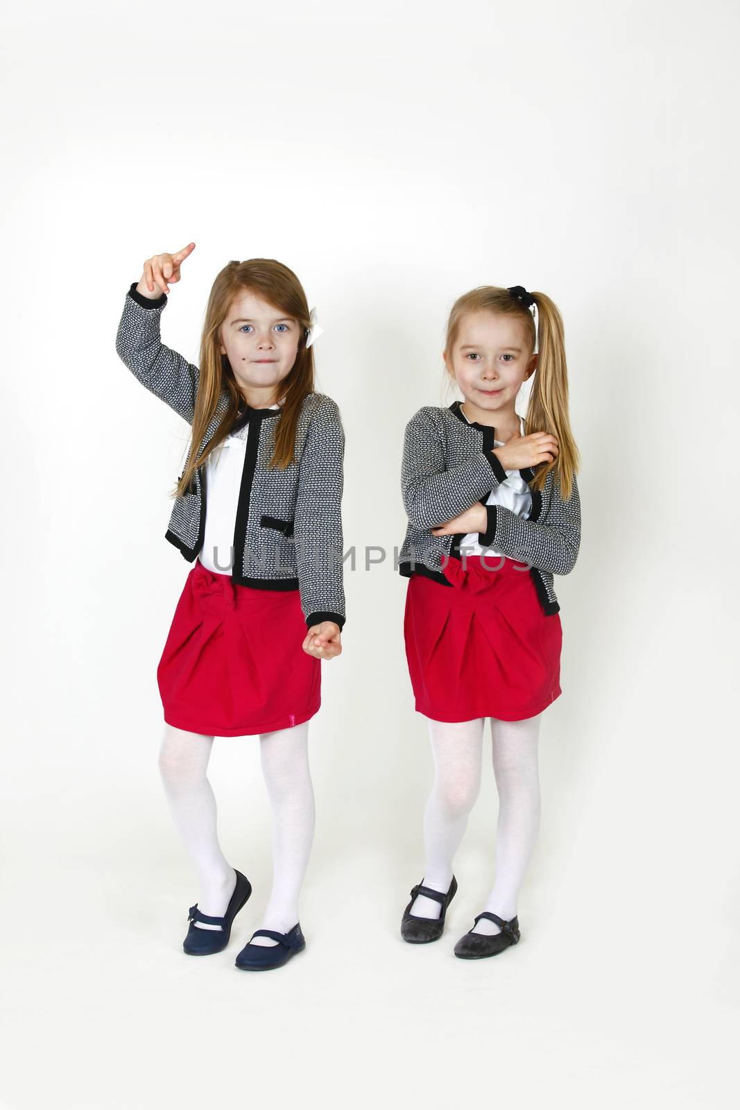 Two young girl ( sisters) in the studio